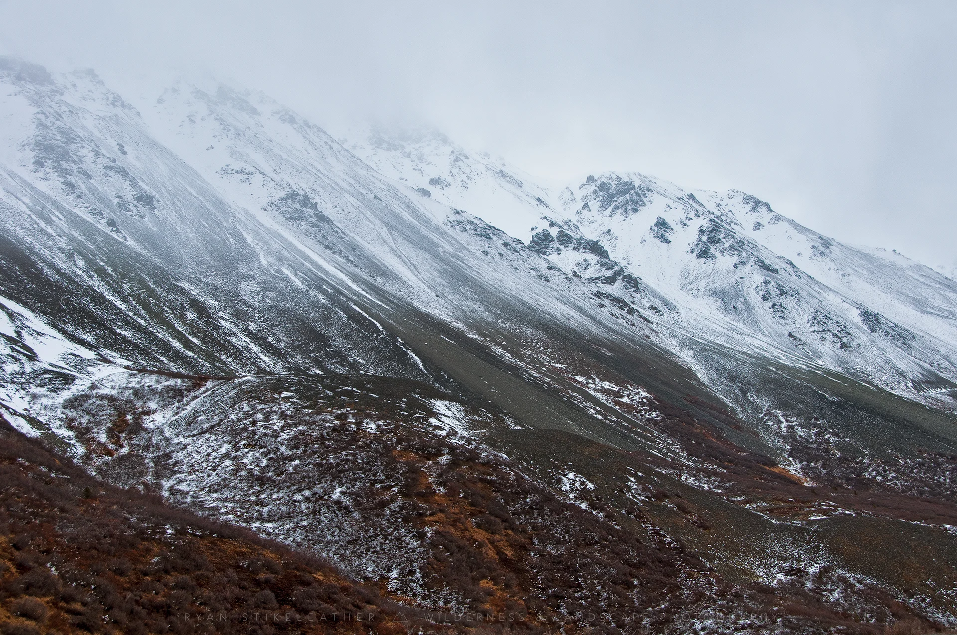 Rainbow Ridge shrouded in fog and snow — photo by Ryan Stikeleather