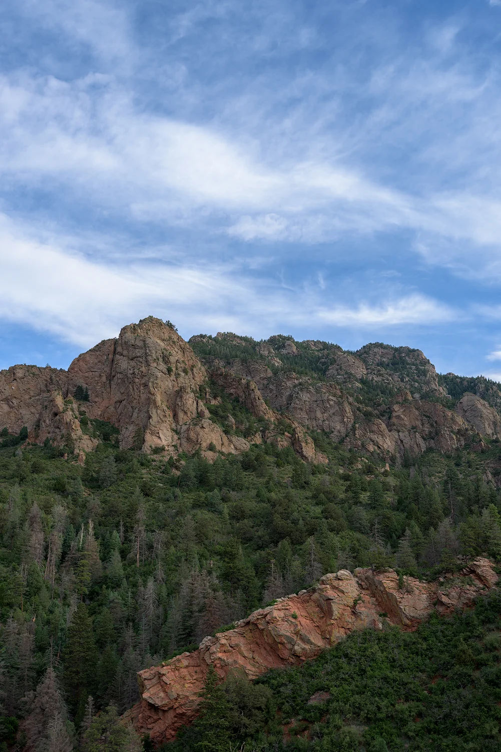 A ridge of exposed rock juts out from the landscape