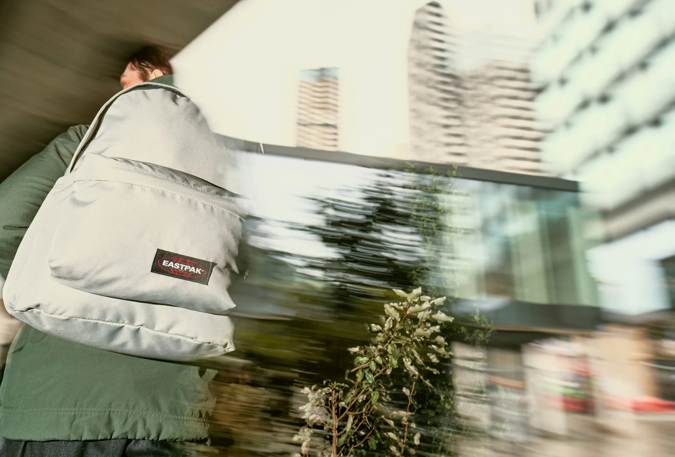Model wearing an Eastpak backpack photographed for a commercial fashion campaign in London using authentic lifestyle and streetwear photography by Daniel Allison.