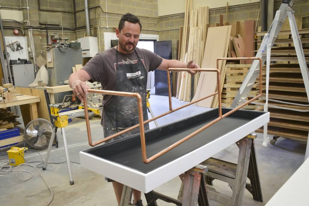 Ian assembling the table - artist collaboration with Aroe.