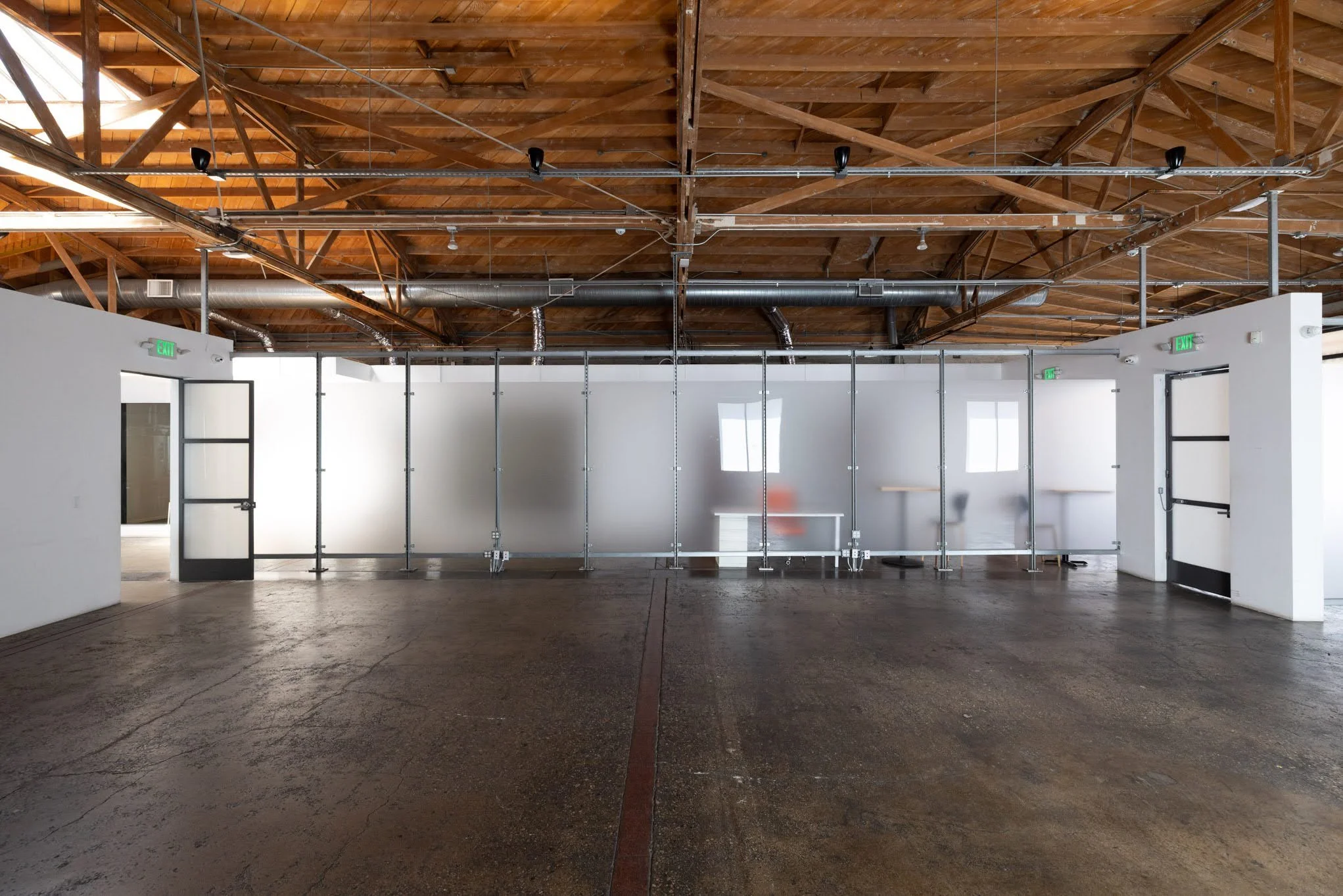  OFFICE WITH GATED PARKING FOR PRODUCT LAUNCHES #27: Santa Monica  Santa Monica 7,000 SF office with gated parking and roll-up doors, ideal for filming, product launches, activations, and events.