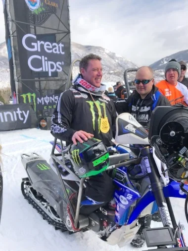 Doug Henry win the gold in Para Snow BikeCross.