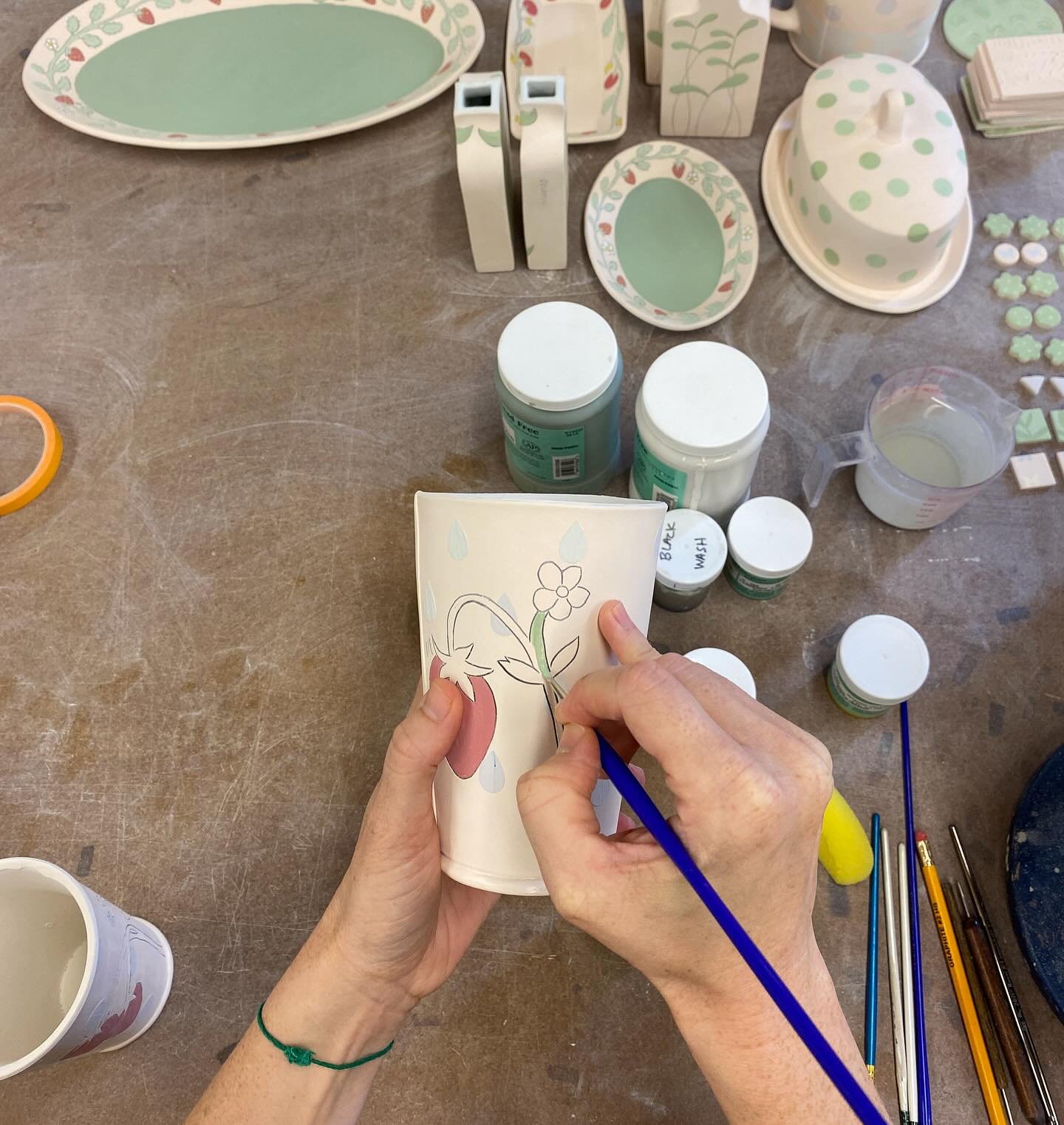 It&rsquo;s glazing time in the studio. 
The underglazing is the longest part of this process. Each color is painted onto the pot in three layers in order to get the vibrancy to remain after clear glazing. It can be quite tedious, but it&rsquo;s alway