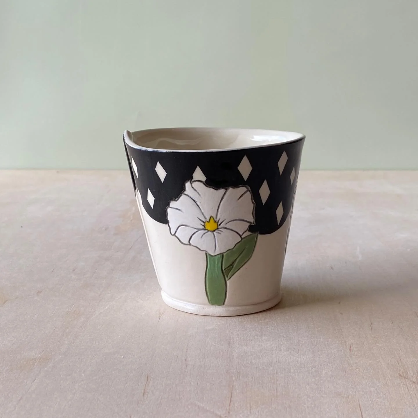 I made this moonflower cup early in the year and finally got it finished. It&rsquo;s one of a kind at the moment. Should I make more? 
.
.
.
.
.
.
.
#slabpottery #handbuiltpottery #handbuiltceramics #handmade #ceramicsofinstagram