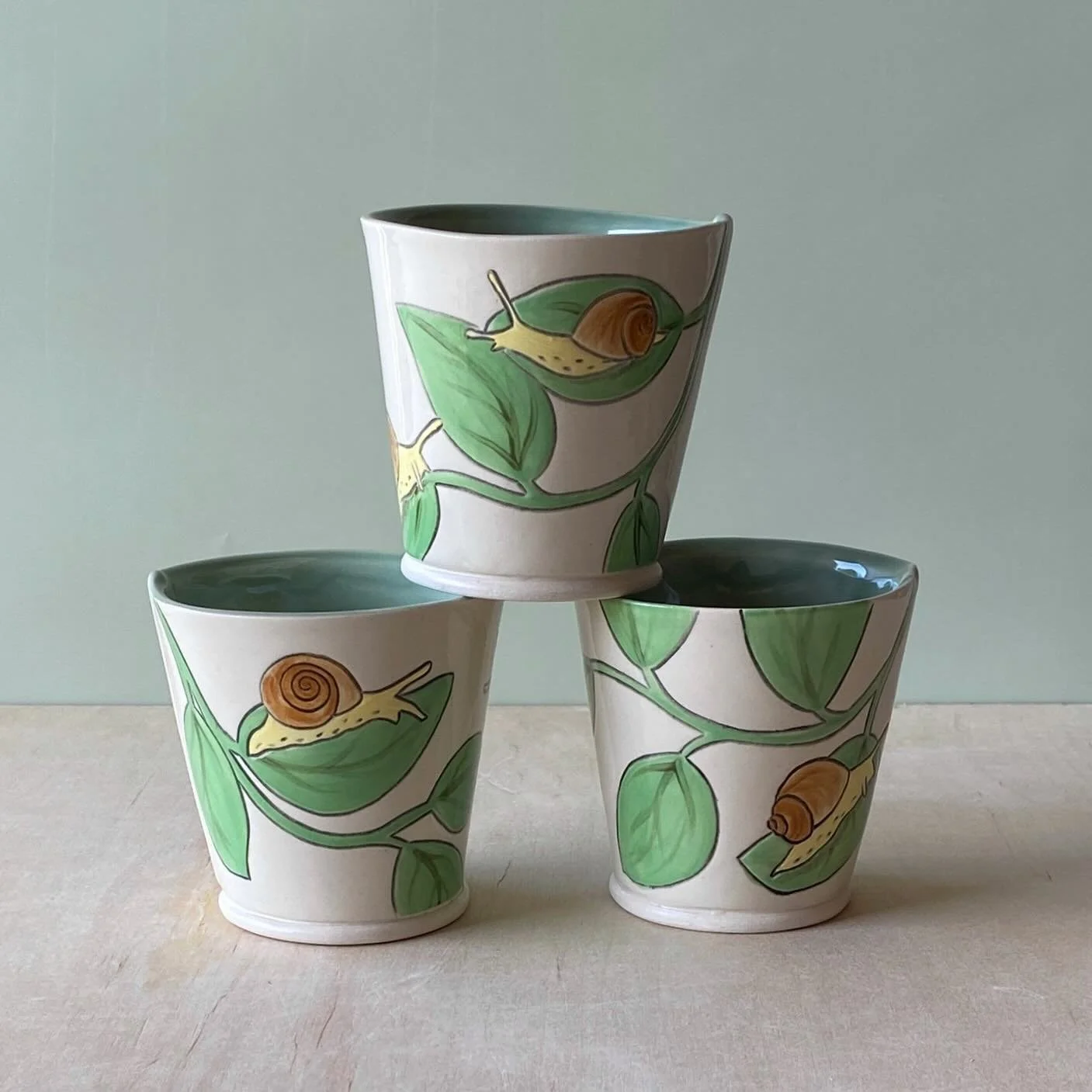 Here&rsquo;s a few snail cups I made in my preparations for festival season. 🐌 
Event dates coming soon! 

.
.
.
.
.
.
#slabpottery #ceramicsofinstagram #handmadepottery #snailart handmade
