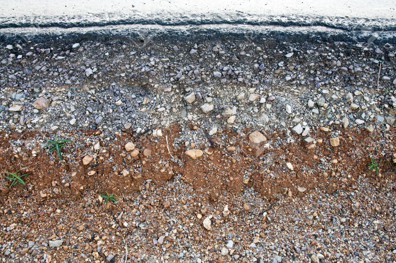 15379944-Section-of-asphalt-road-in-a-rural-area-Stock-Photo.jpg
