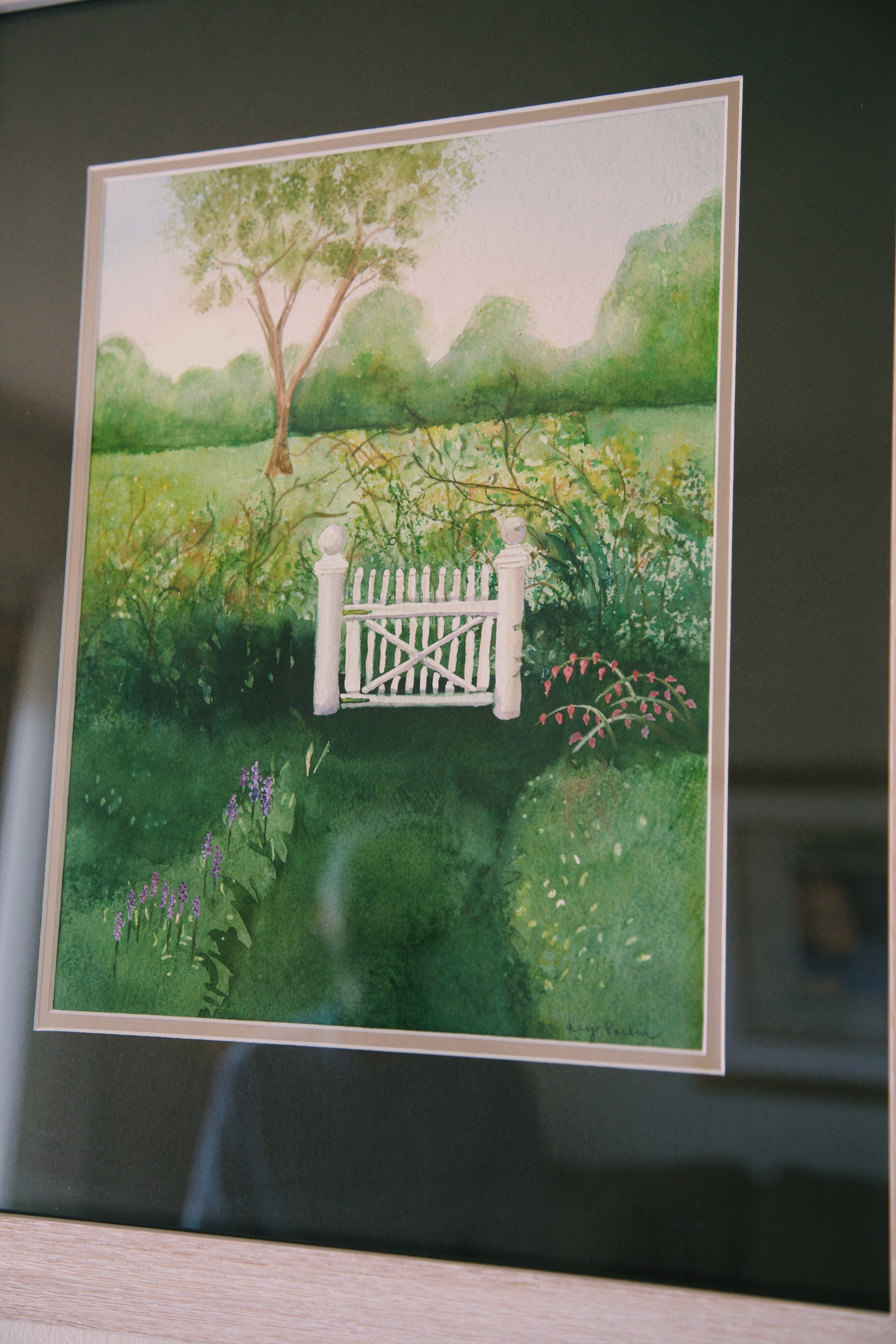 "This is a watercolor I did. I think this is what I will see when I die. I'll walk right through that little garden gate and meet God."
