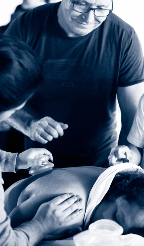 Dan Wunderlich working with a patient.