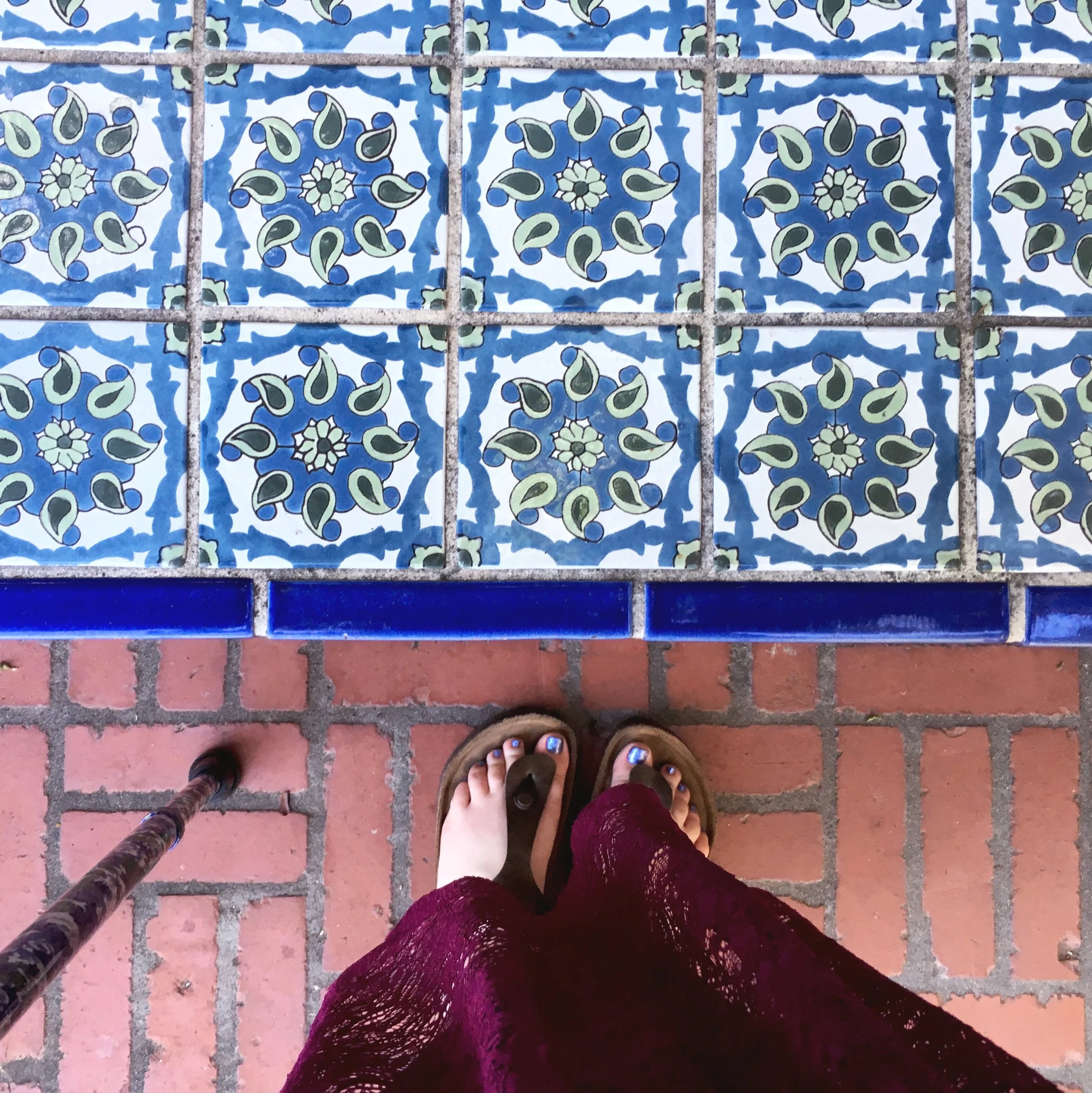 My feet and my cane at a wedding in 2016.
