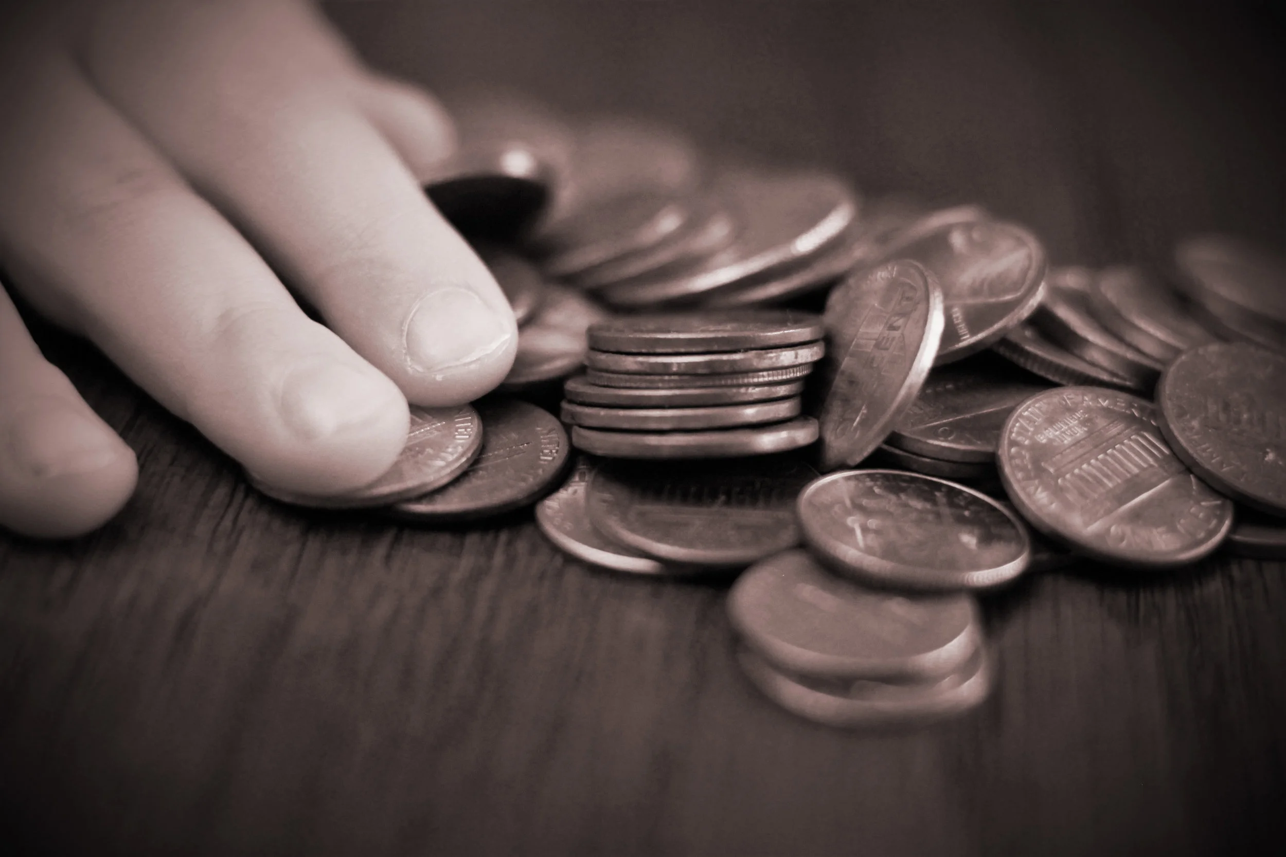 Hands with Coins.jpg