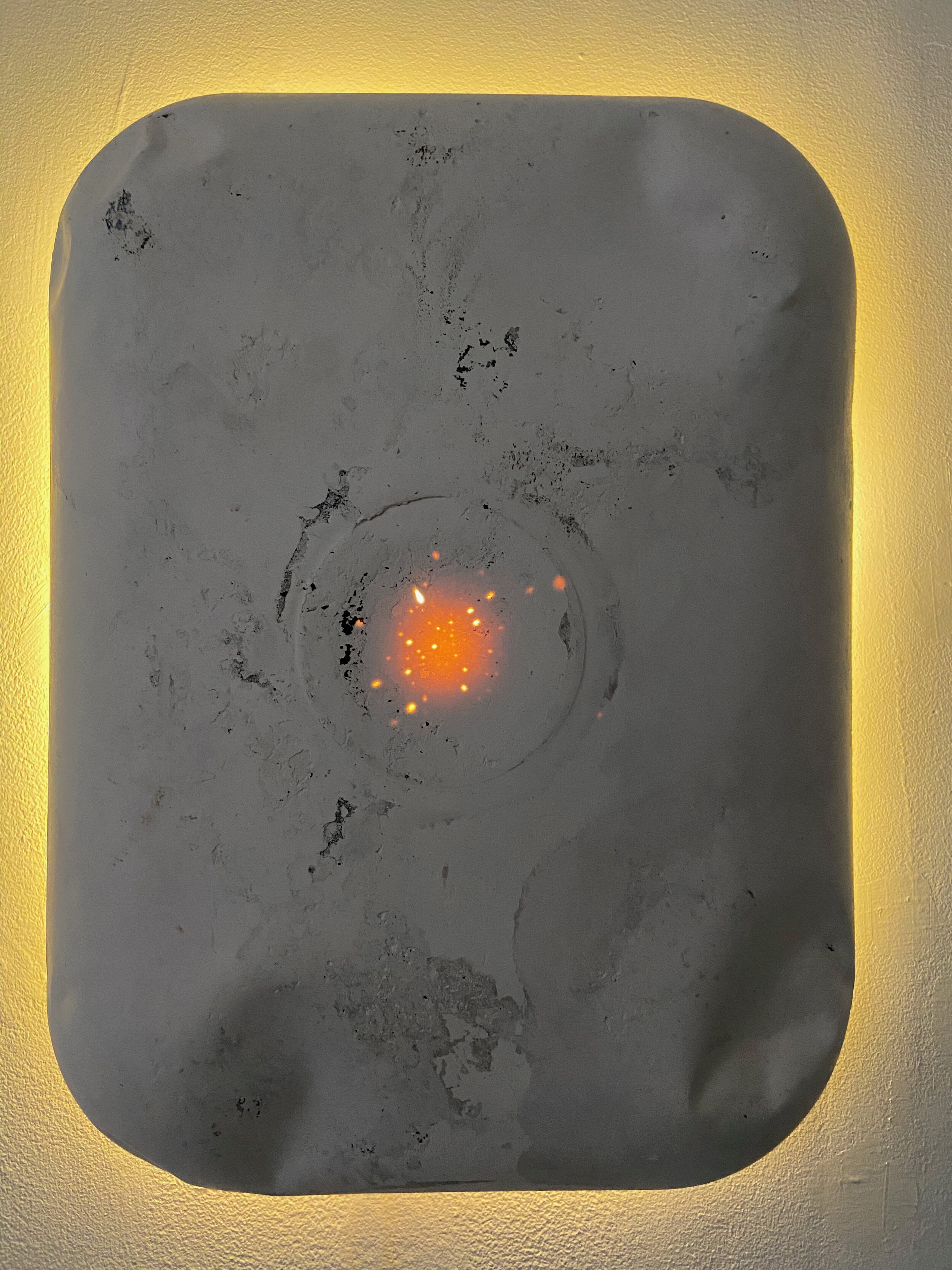 When the plaster is thin enough, it allows light to pass through, creating this natural glow.