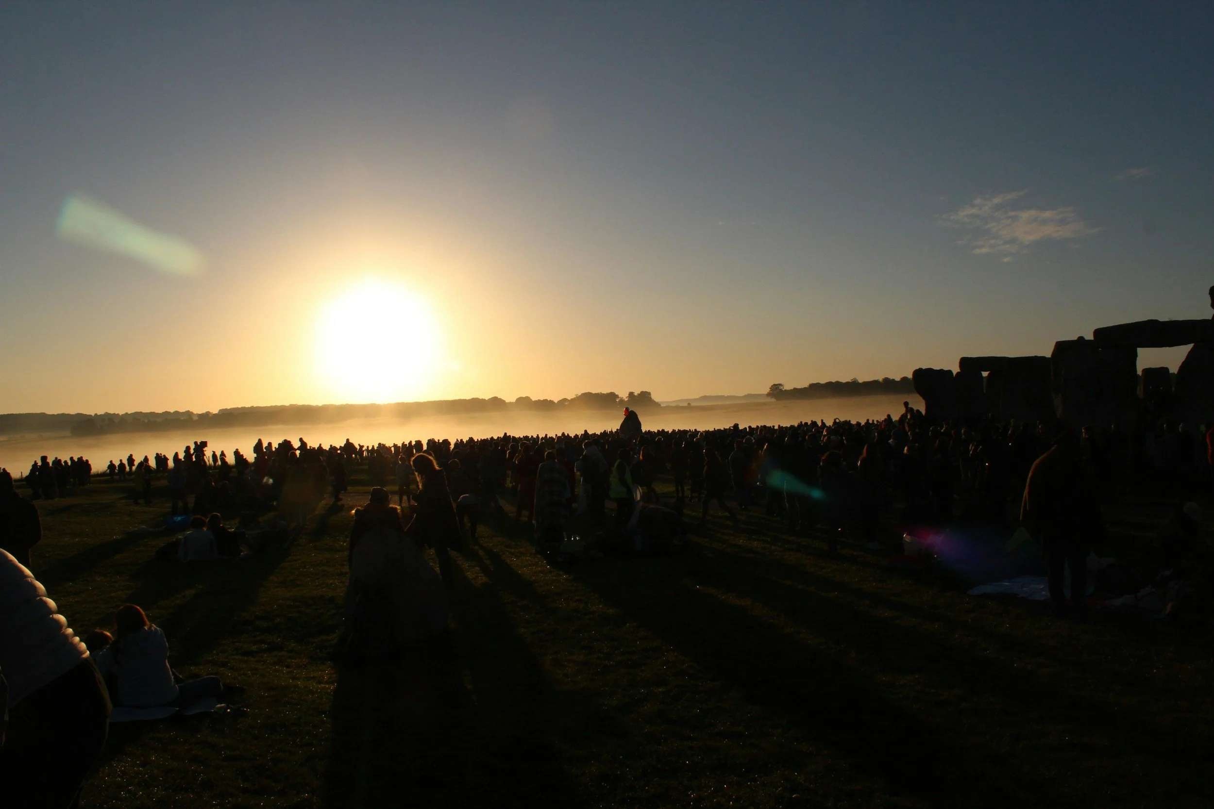 Winter solstice sunset symbolizing transition, reflection, and new beginnings connected to the New Moon in Sagittarius.