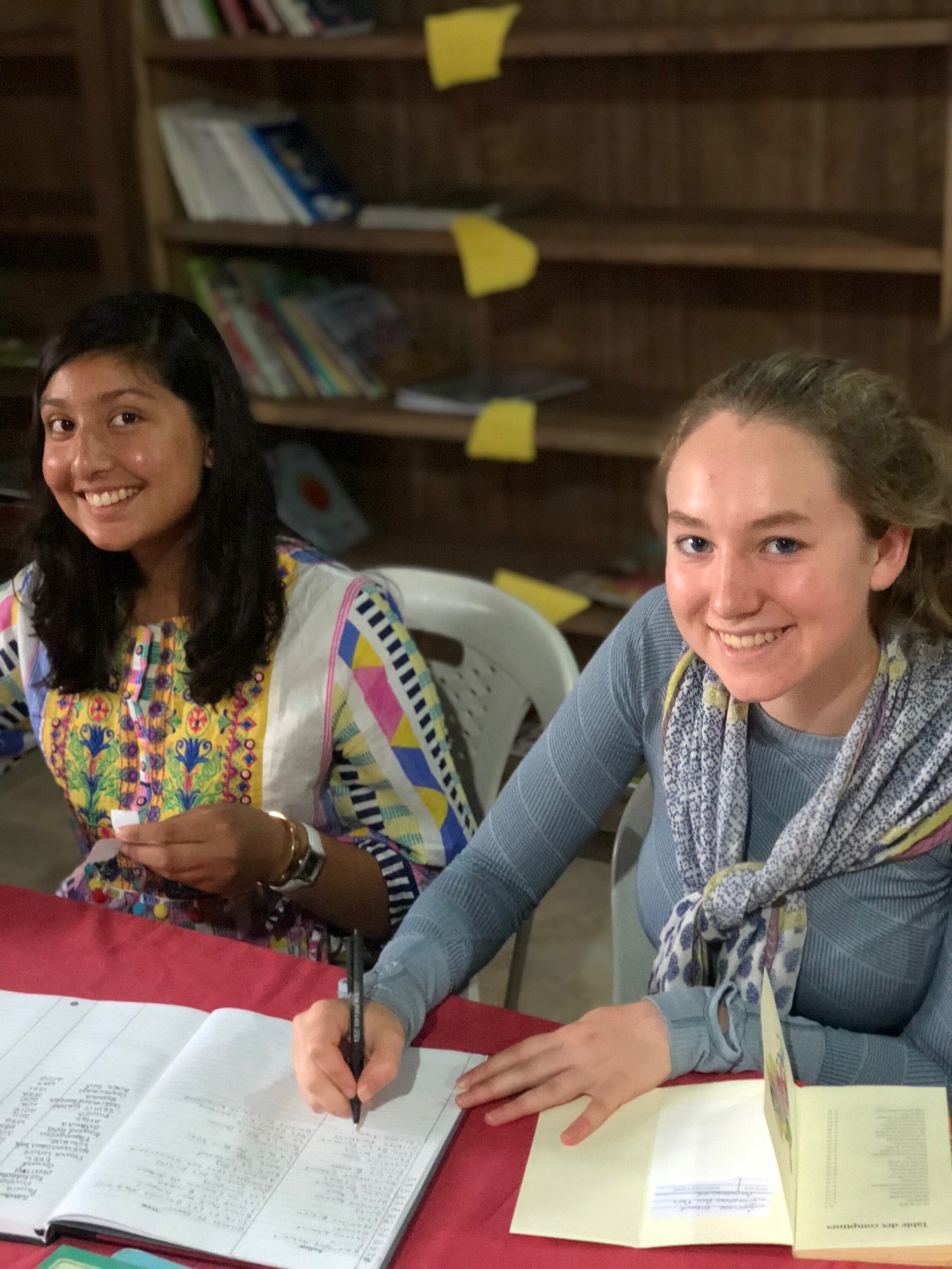  Zoha and Hannah cataloging books in the library in Morocco. 