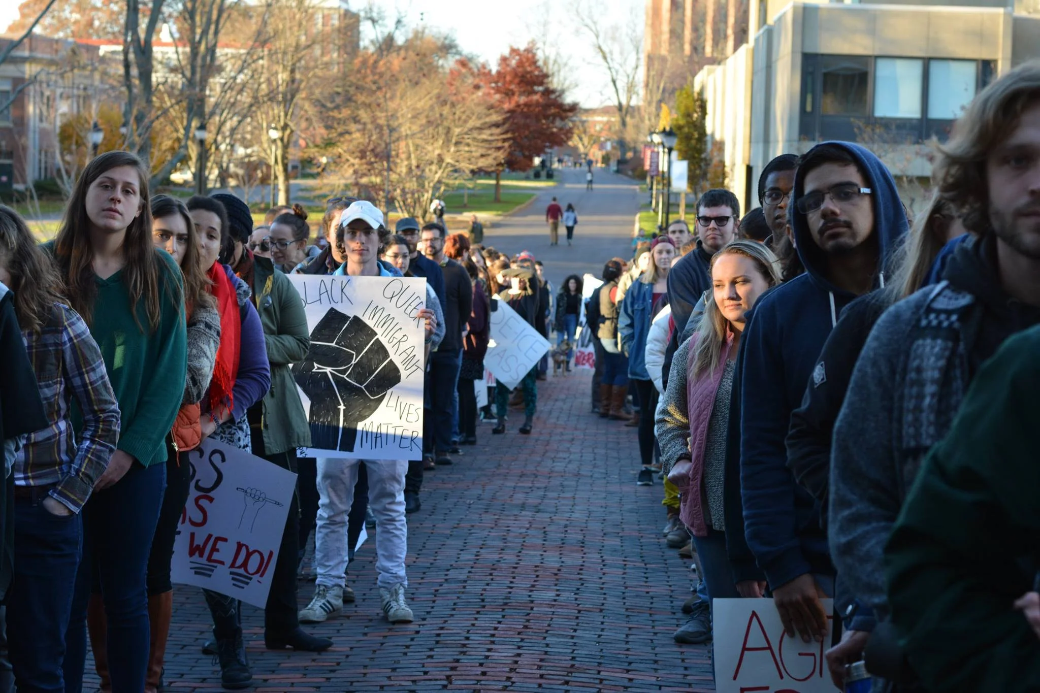 Protestors at UMass wanting a sanctuary campus formed two lines to go into Whitmore for a five minute sit-in November 18, 2016.