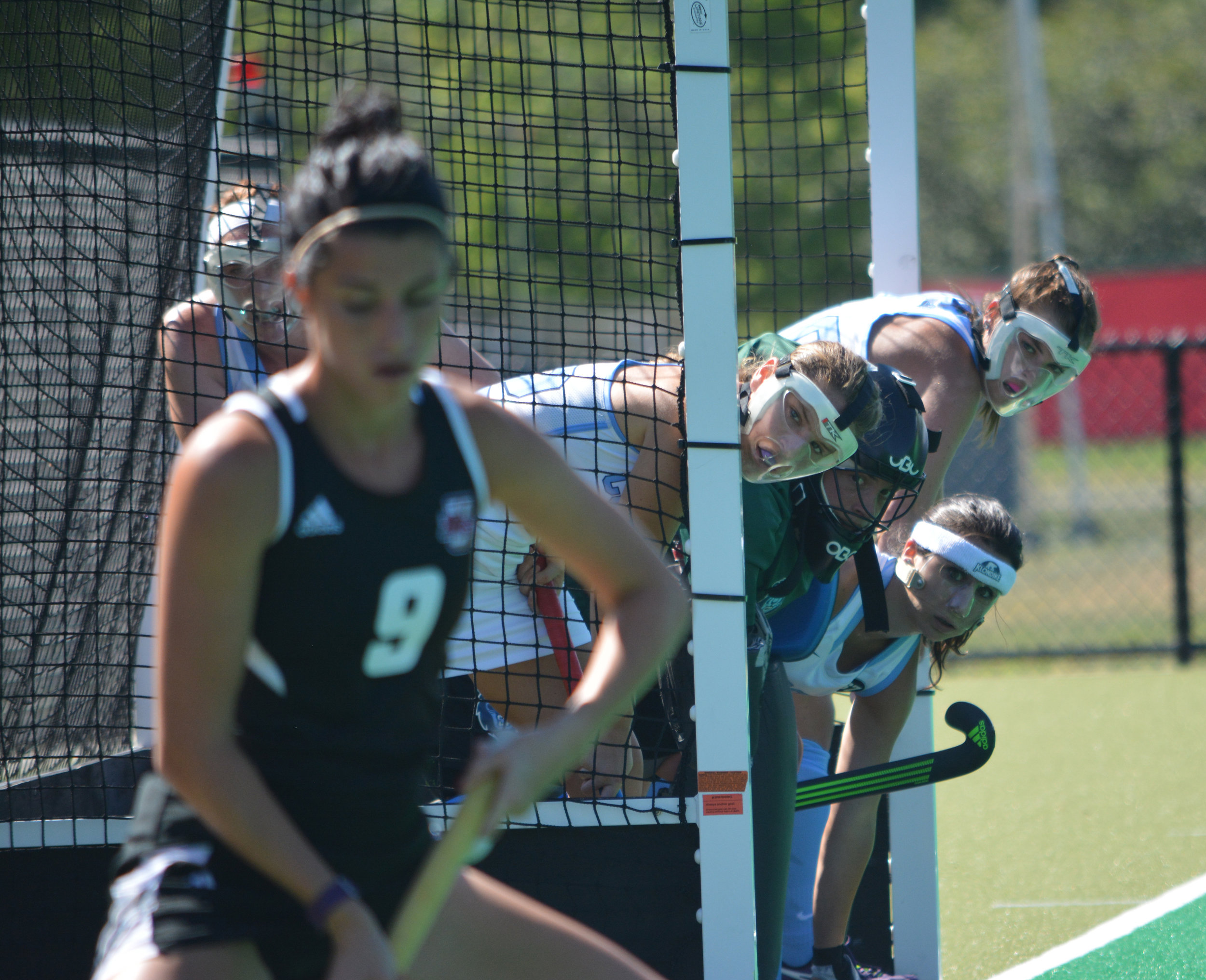 Players from Columbia University wait for UMass senior Izzie Delario to put the ball into play at Gladchuk Field September 2, 2016.