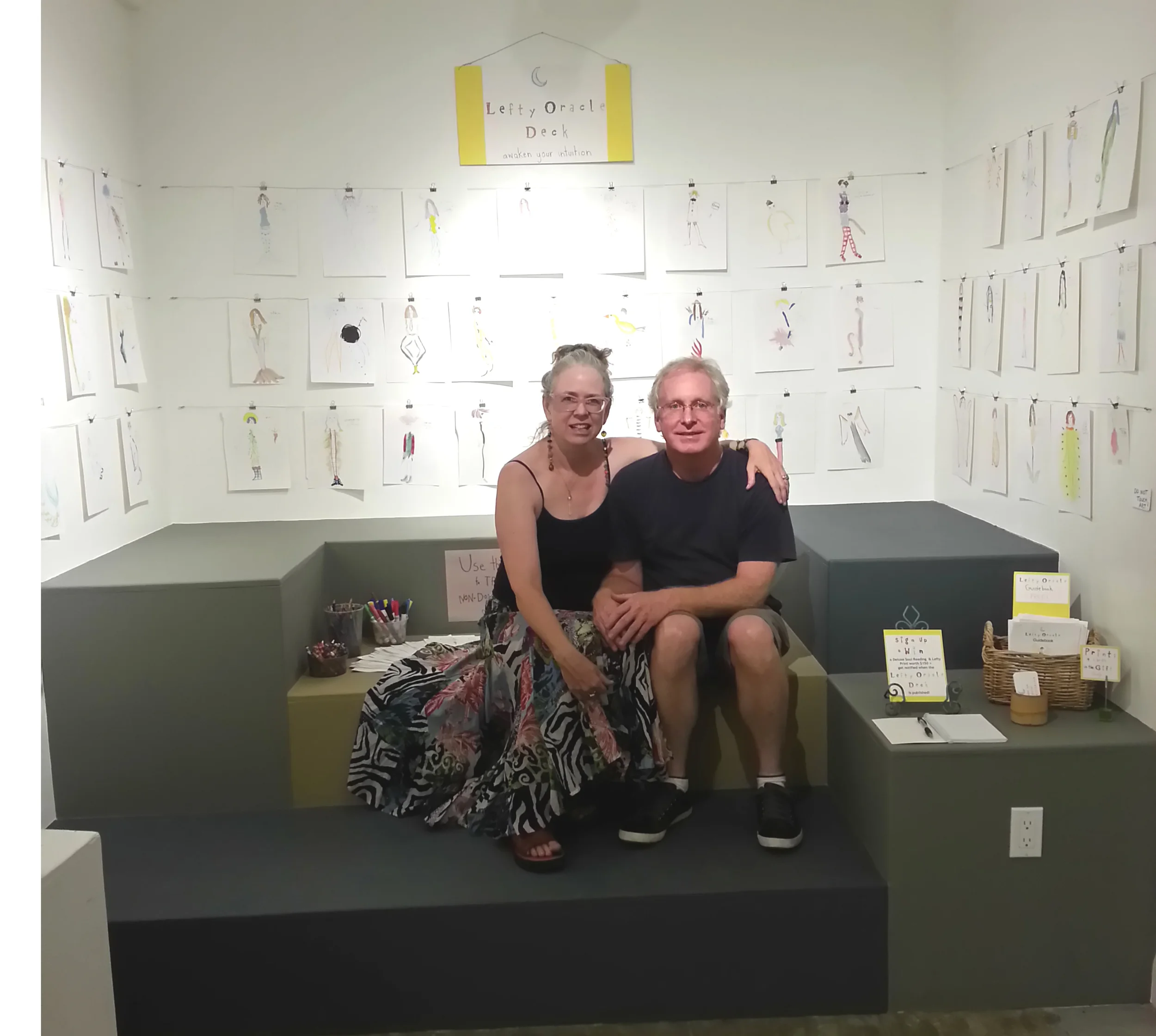 Me and my amazIng husband Mark who helped me design and install my lefty oracle paintings at Riverside Art Museum.