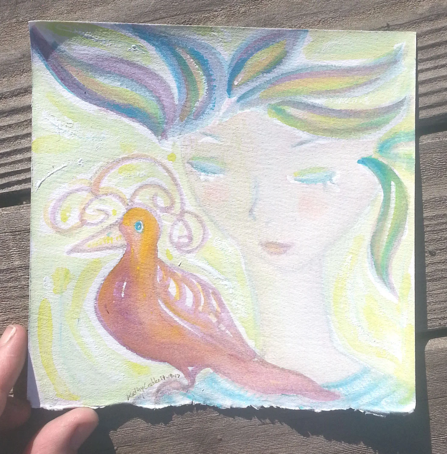 Bird Rosy in hand.jpg