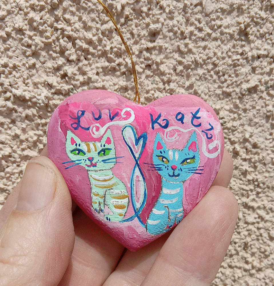 Luv-Katz-Heart-in-hand-stuc.gif