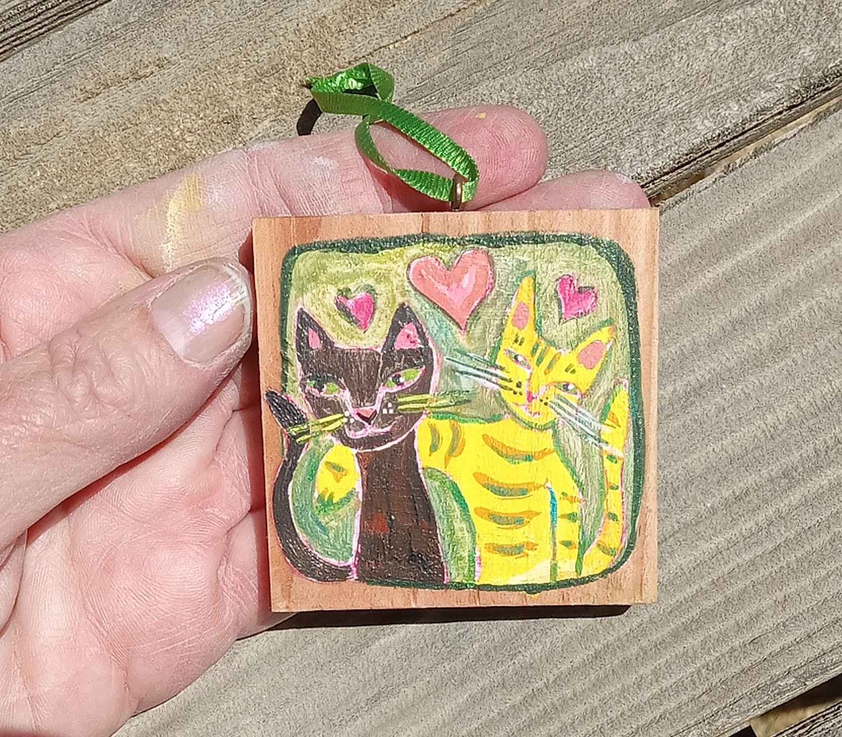 Luv Is Ornament in hand.jpg