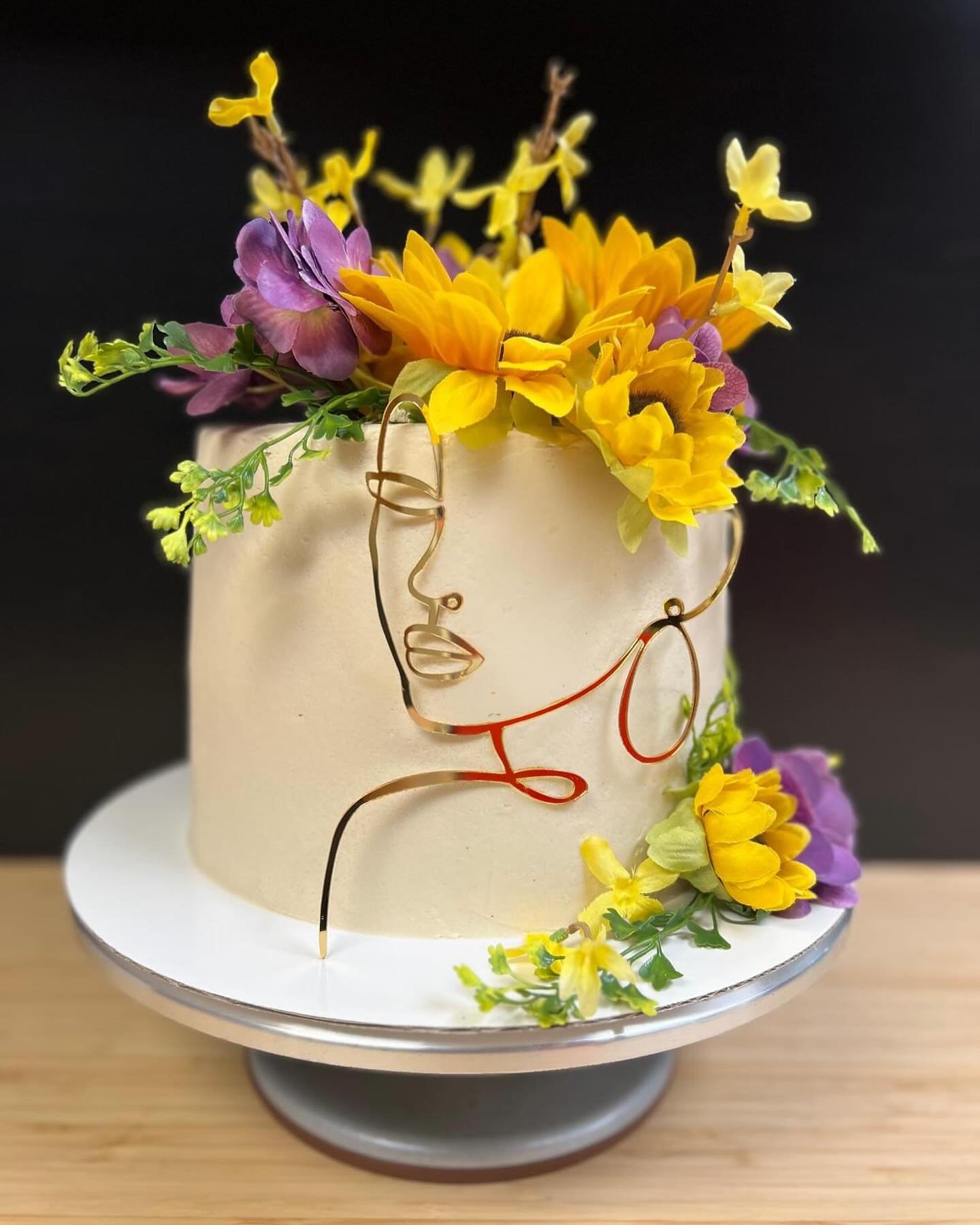 We LOVE how this simple, yet stunning cake came out 😍 Sunflowers are always a beautiful addition to a cake, but we think the purple really made them pop 🌻🪻

 #johnsonvillecakes #cakesofwacotexas #cakesofmcgregortexas #cakesofwaco #birthdaycakesofw