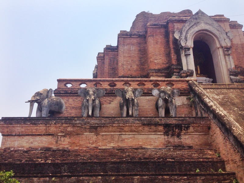 The exterior of an old brick temple in Chiang Mai
