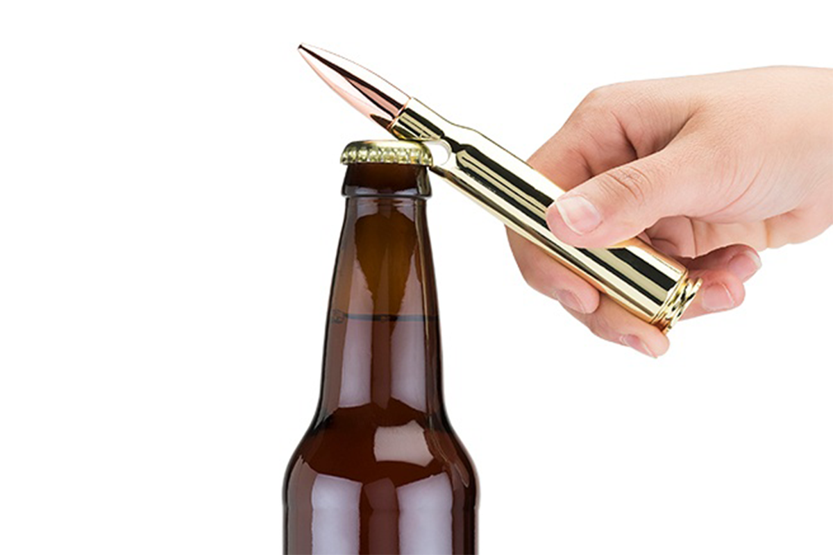 Bullet Bottle Opener Choose a bottle opener that's of a higher caliber than most. A burnished copper projectile with an equally polished gold casing simulates the size and impressive shape of a 50 caliber bullet, built tough to break open any brew of his choosing.