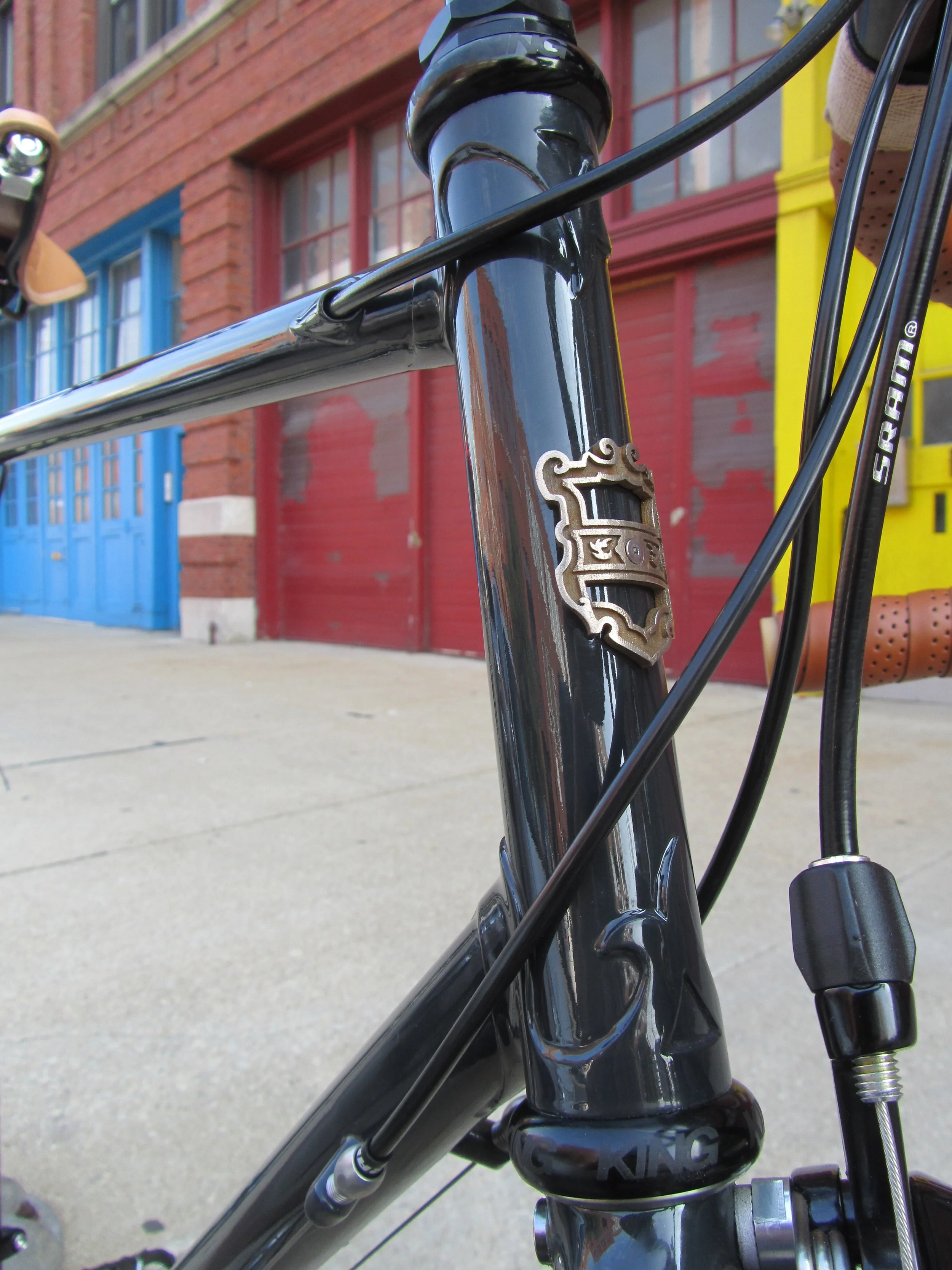  Lugged construction with custom head tube detail  Steel tubing, Columbus ZONA  Wet paint by Chester Cycles  SRAM Rival drivetrain, 700c wheels  Internally routed rear brake cable  $3530 total cost 