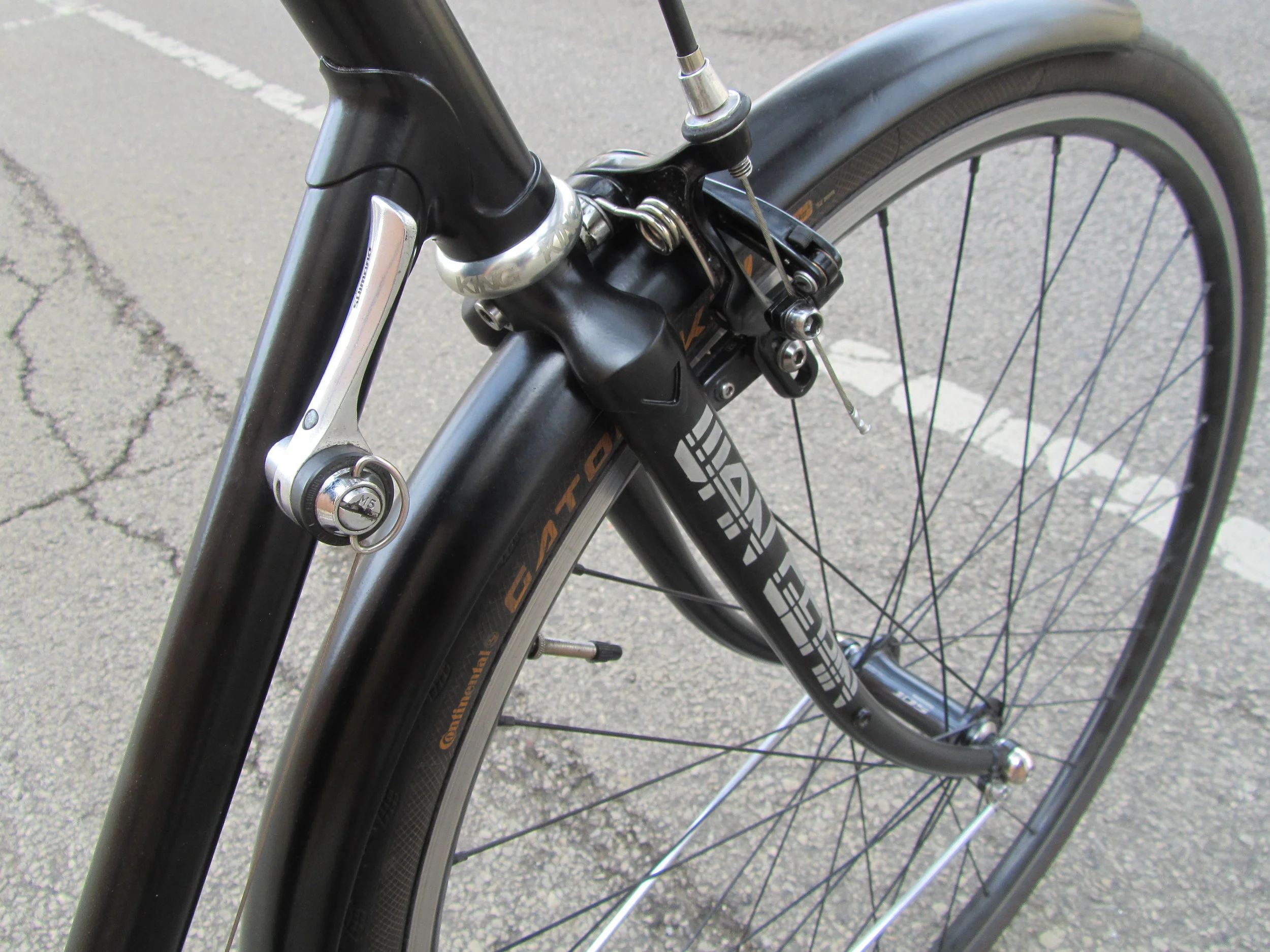  Lugged construction  Steel tubing, Nova cycles  Satin black powder coat finish with silver branding  Used components, 700c wheels  Internally routed rear brake cable, fenders powder coated to match frame  $2900 total cost 