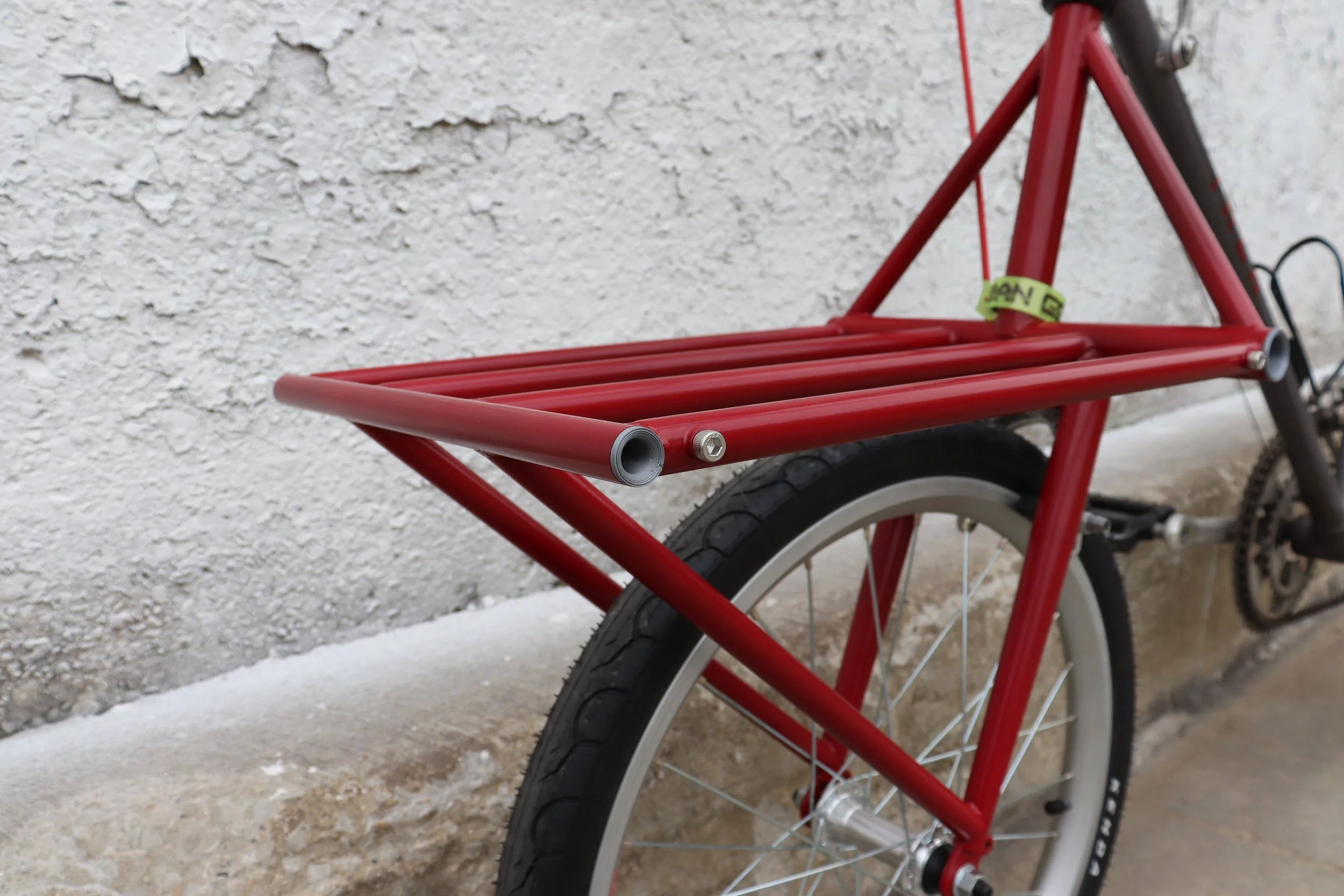  Converted 1984 61cm Trek 520 with custom TIG welded cargo fork   Steel chromoly tubing   Matte red powdercoat finish   Used components, 700c rear, 20” front wheel    