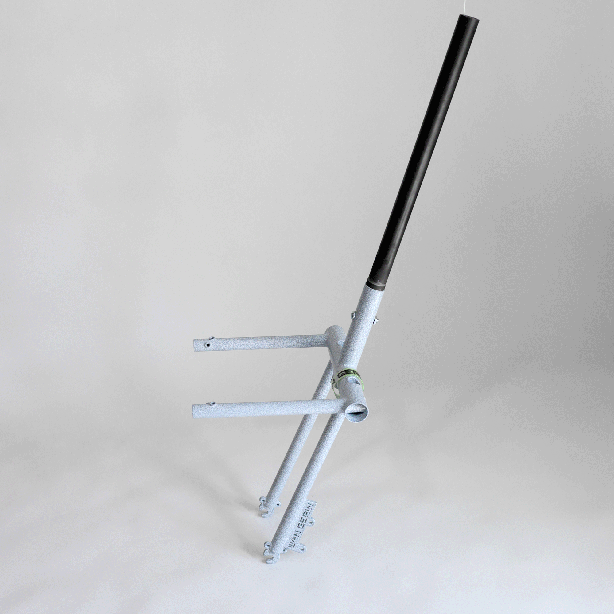 I make custom forks with two integrated arms for mounting racks, bags, or baskets (designed with the Wald 157 and 1392 in mind). The design aims to be minimal by providing what's needed and nothing that's not.