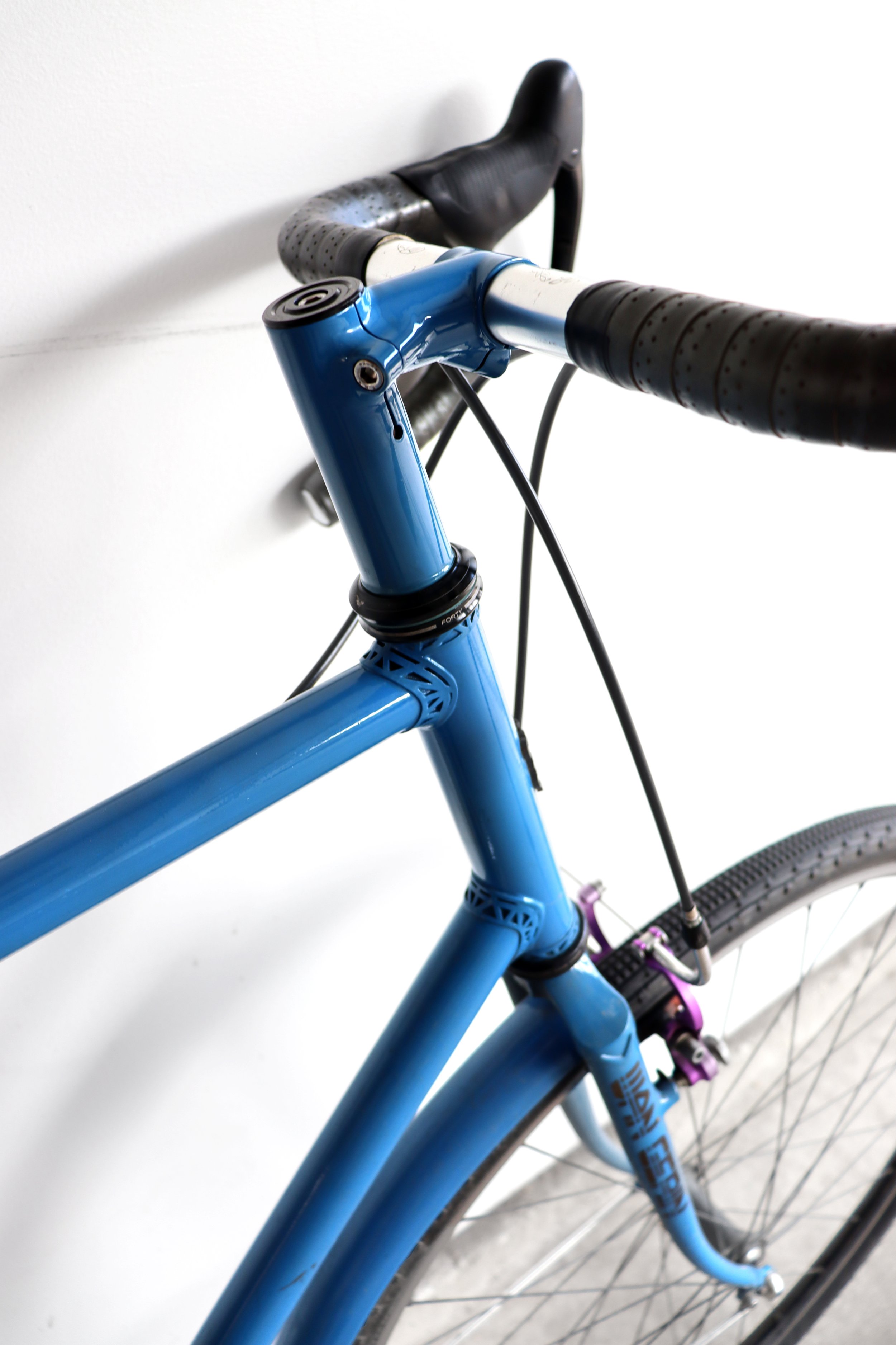  Lugged construction with custom designed and 3D printed stainless steel lugs   Steel tubing, Columbus ZONA   High temp wet paint with masked metal branding, beneath clear powder coat finish   Used components (SRAM Rival), 700c wheels, Paul cantileve