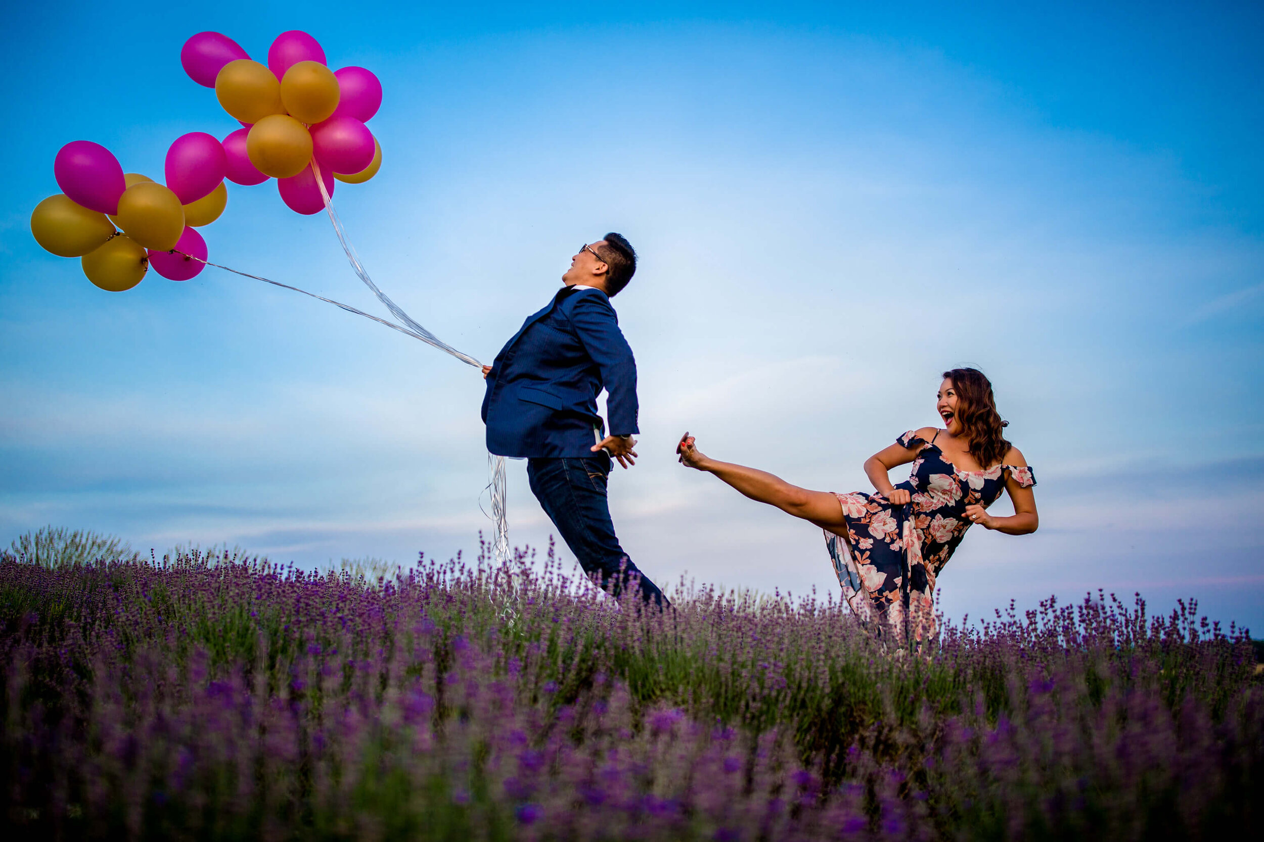 29-balloon-kick-lavendar-field-springfield-manor-thurmont-manor-engagement-session-photography-by-bee-two-sweet.jpg