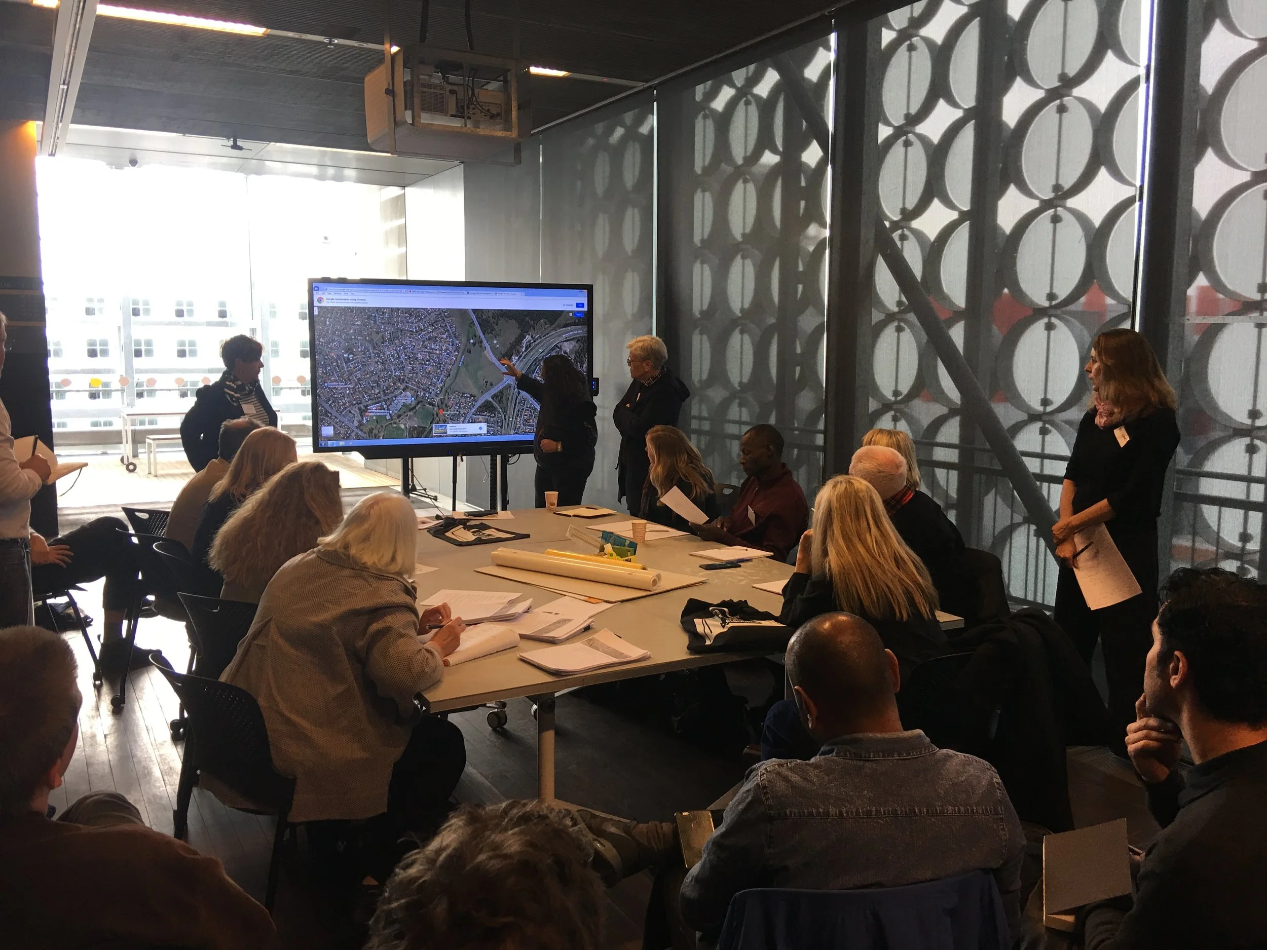 Corina Marino, Jenny Bisset and Anne Loxley presenting the Blacktown Native Institution site to workshop participants. RMIT Design Hub, 29th June 2018. Photograph by Brook Andrew.