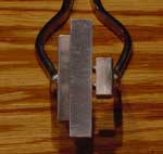MPM Tongs - No Space between Centering Tool and Specimen (left face)