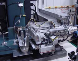 MPM's Automatic Charpy Specimen Transfer System on a Floor Model Impact Machine