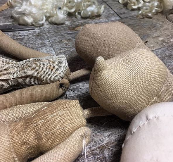 The fabrics are coloured with natural dye and the dolls are stuffed with wool and sewn with silk and metallic threads.