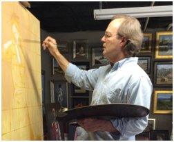 Robert Crum painting in his studio at Clearwater Artist Studios