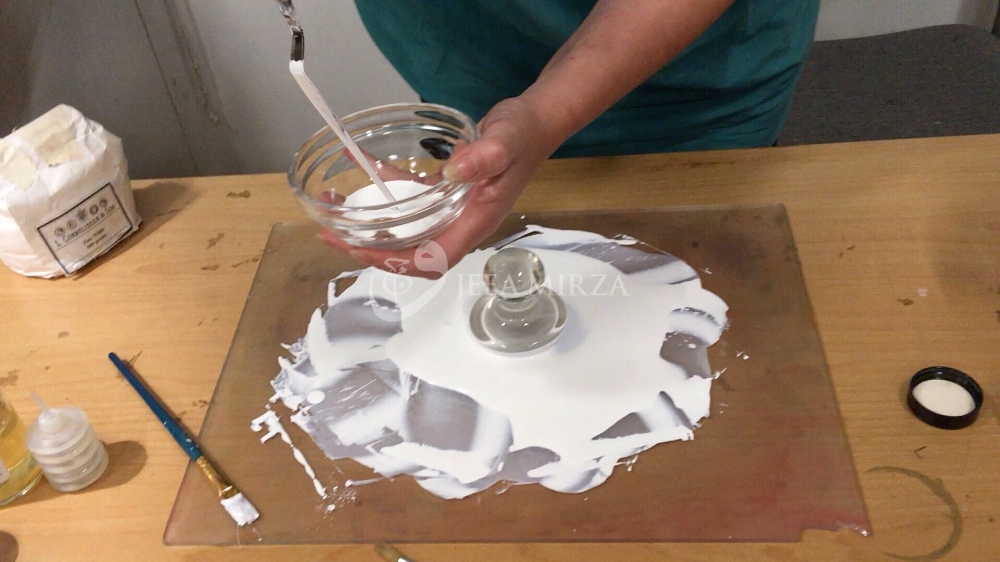 transferring the paint to a bowl