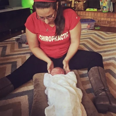 Little Declan getting his first adjustment just days after a safe, natural homebirth.