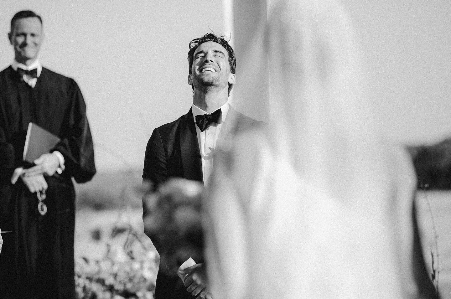 I love everything about this photo &mdash; from the pride in the officiants face (the bride&rsquo;s FATHER!) to the expression on the groom&rsquo;s face and the silhouette of our stunning bride.  And the mastery of photography by @ambervickeryphotogr