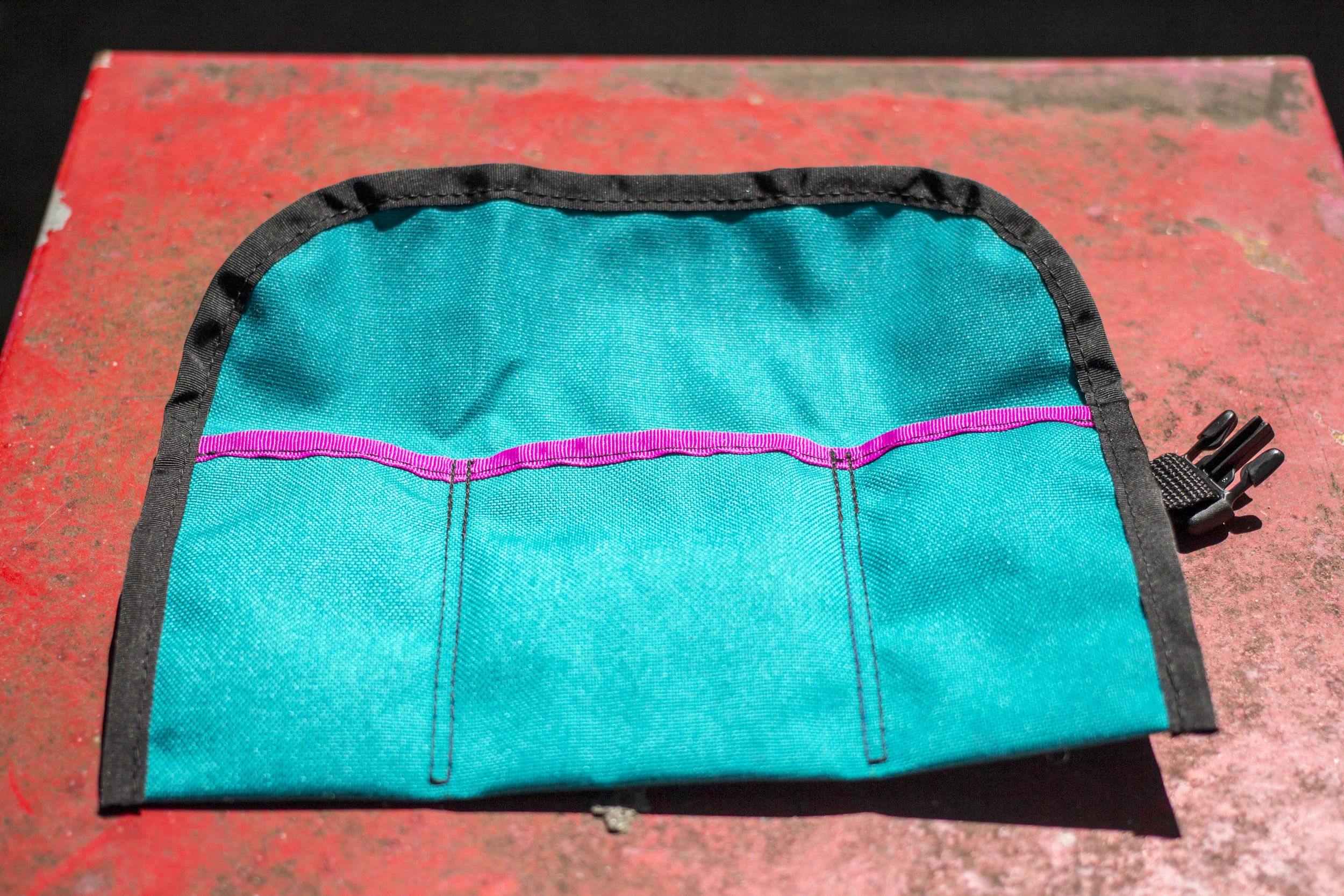 A teal limited-edition Big Tuna x PDJ tool roll.