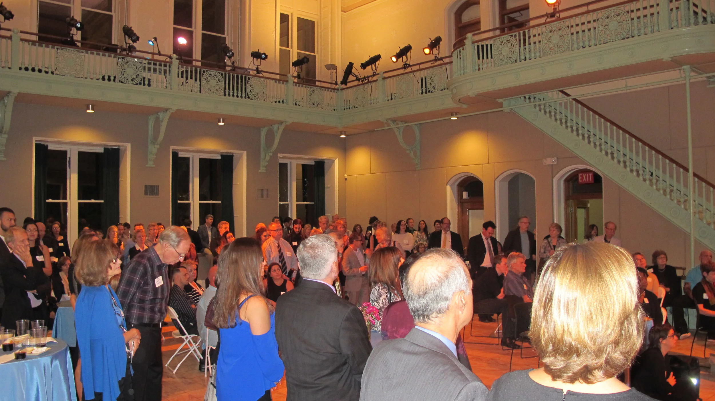Guests listen to speakers at the Cambridge Multicultural Arts Center