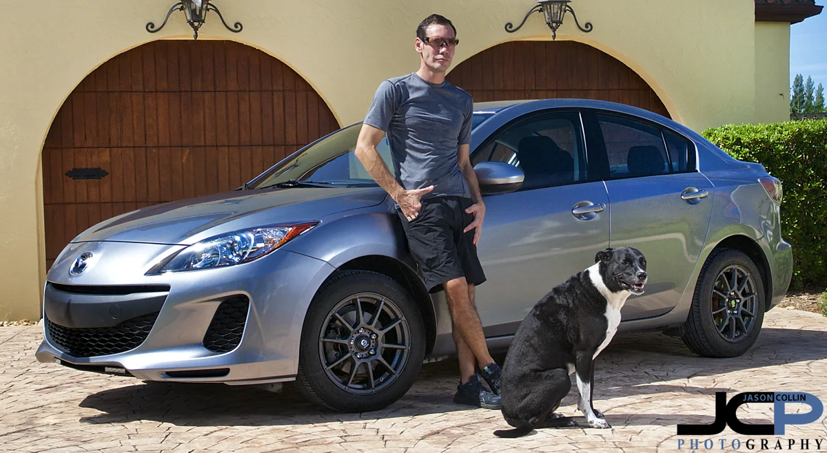 Self-portrait of myself, Kiki and the new Mazda3! - Nikon D300 with Tamron 17-50mm tripod mounted @ f/11 1/320th ISO 200 - Strobist: SB-800 in 43" brolly to frame right