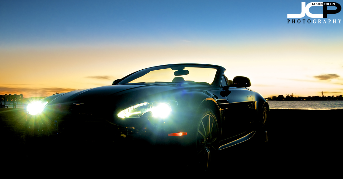 Aston Martin V8 Vantage Roadster shining its lights as twilight falls over Tampa Bay - Nikon D300 Tamron 17-50mm @ f/8 1 sec ISO 200 tripod mounted