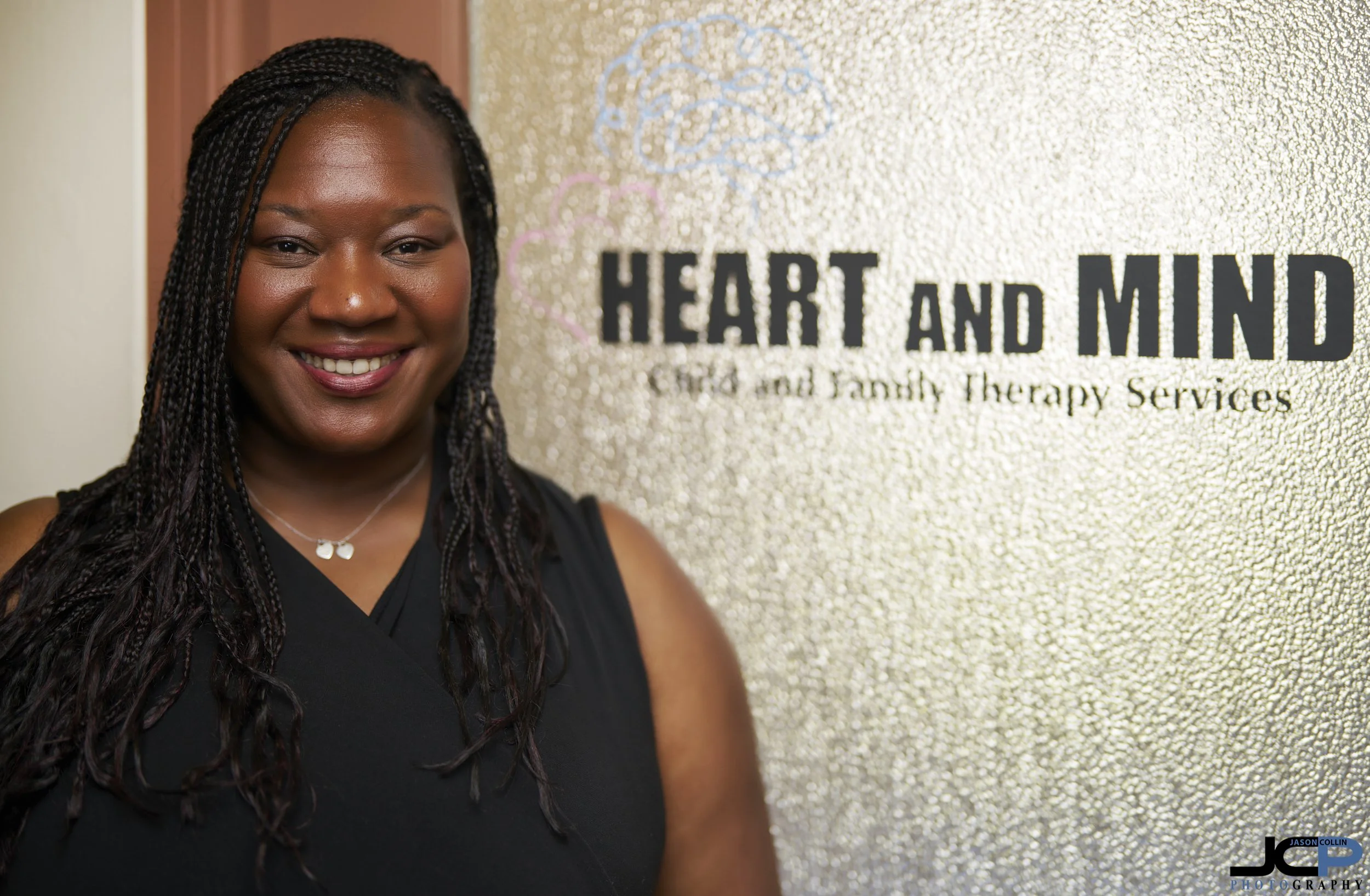 Personal branding portrait of Monterey therapist Nefertari Rossell at Heart & Mind Child and Family Therapy Services