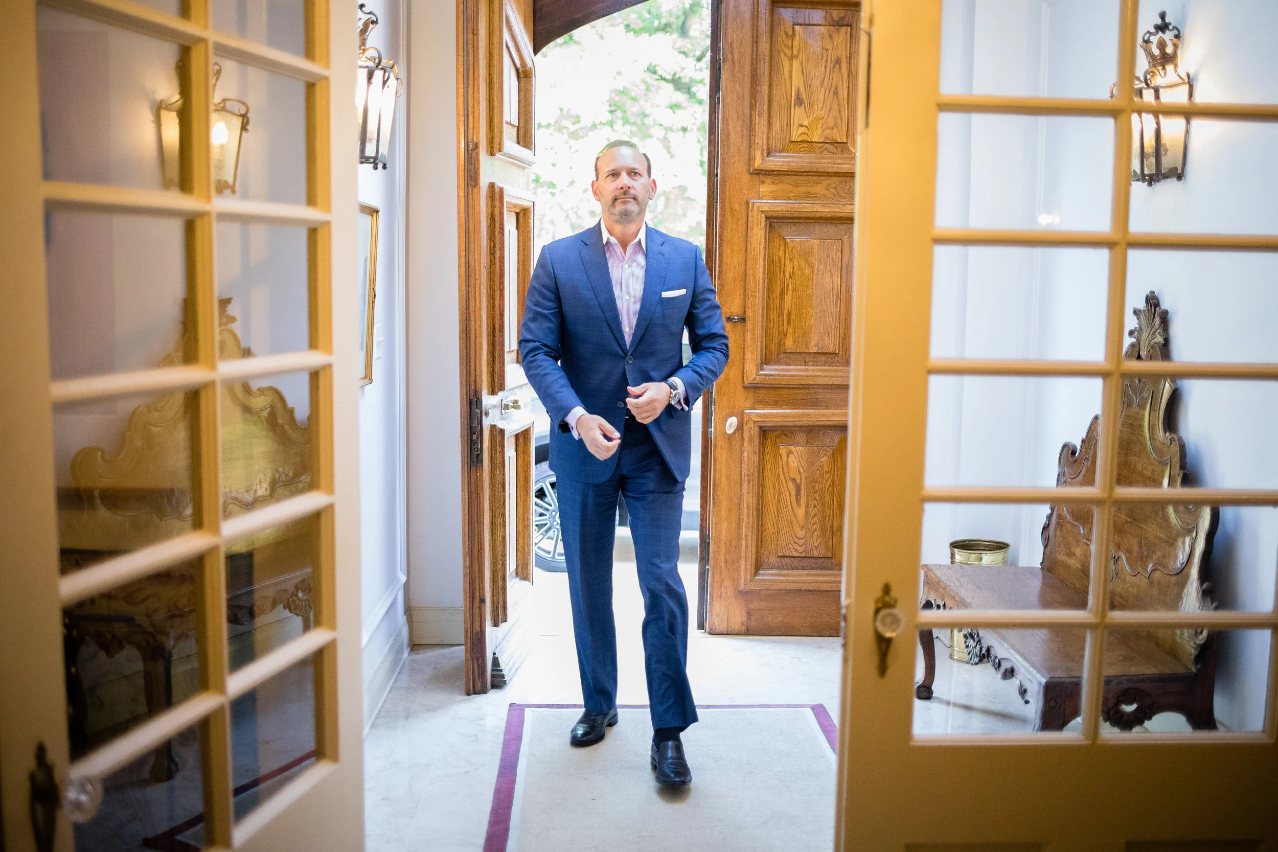  Member Dave Ciccone enters the residence 