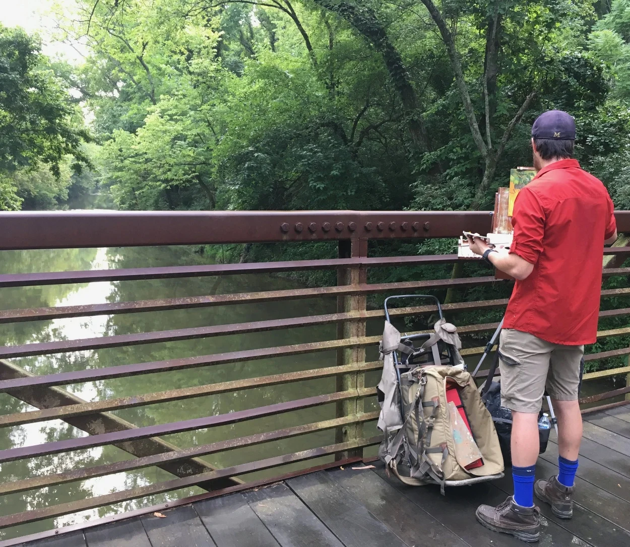 Plein air artist painting at Whites Creek Greenway.