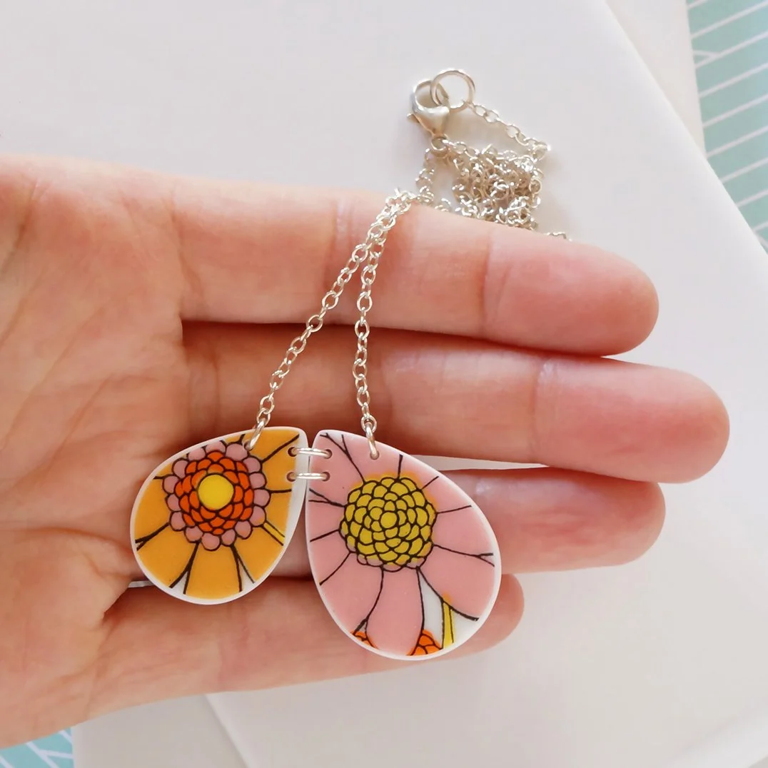 Vintage china necklace with two drop shaped pieces with orange and pink flowers and sterling silver chain handmade in portland oregon by Material+Movement