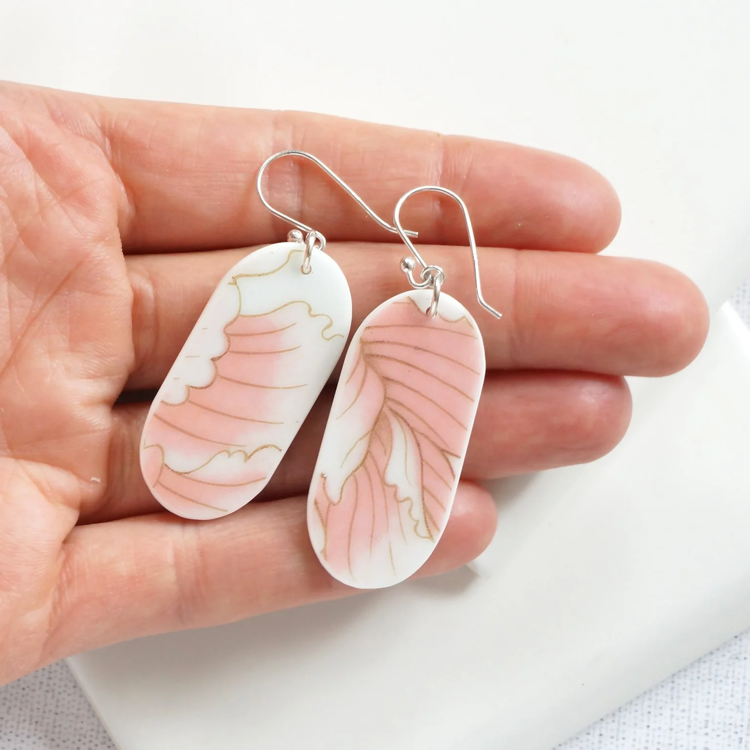 Vaporwave Capsule Earrings made from vintage china by material and movement