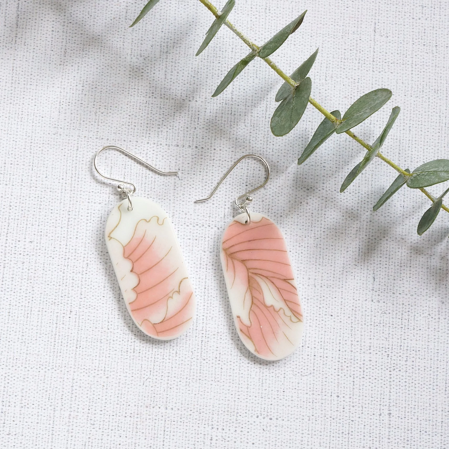 Vaporwave Capsule Earrings made from vintage china by material and movement